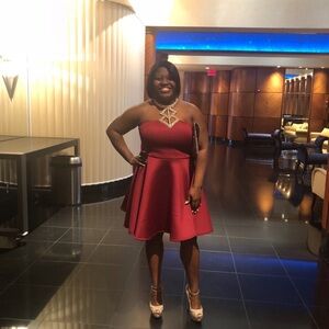 Beautiful red evening dress. Perfect for weddings or a formal function.